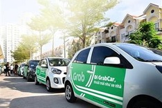 Vietnamese taxi company sues Grab for unfair business practices