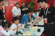 Quang Liem regains international super GM title