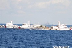 Chinese vessels fiercely defend illegal rig