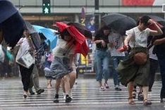 Strong typhoon churns towards Japan