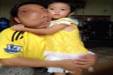 Young man with "devil" face calls for help