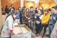 Young woman's social enterprise revitalises do paper-making trade