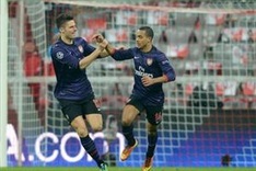 Gallant Gunners bow out despite win in Munich