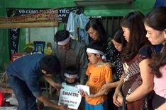 Donation to two boys in Ha Tinh