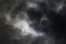 Millions look skyward as rare eclipse crosses Asia