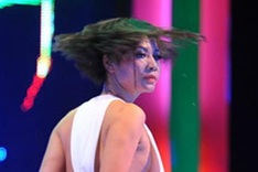 Model, singer fined for smoking and scanty clothes