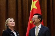Clinton to press wary China in Beijing