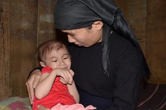 Poor ethnic little girl faces leukaemia