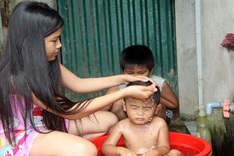 Little girl looks after seriously ill father