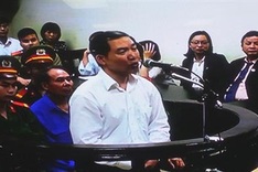 Duong Chi Dung gets paid during two-year imprisonment