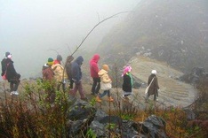 Ancient town at foot of misty Don Cao Mountain