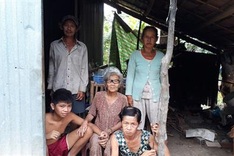 Poor woman cares for mentally-ill adult children