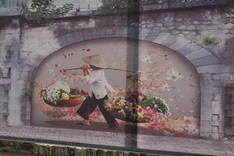 Hanoi rail viaduct decorated with colourful paintings