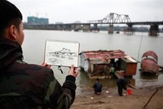Local students sketch historic Long Bien bridge