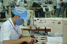 Firms try to encourage workers to return after Tet