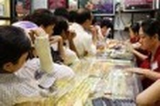 Fitch warns of Vietnam rating downgrade on uncertainty