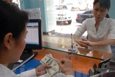 International organisations laud SBV exchange rate adjustment