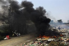 Hanoians threatened by burning rubbish tip