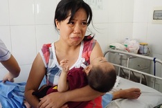 Father diagnosed with encephalitis as son suffering from cerebral palsy