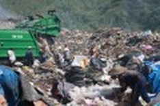 No fun in the sun for Nha Trang's trash workers