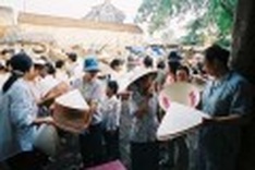 Chilling at the conical hat market
