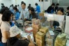 Tight credit puts pinch on property market