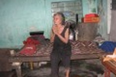 Lonely and depressed, elderly woman has little hope