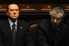 Berlusconi says will resign after economic reforms