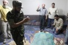 Gaddafi family demands body; NATO ends Libya war