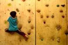 Climbing wall raises spirits at one orphanage