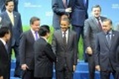 Bickering G20 vows to avoid currency war
