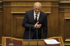 Greek PM wins confidence vote, vows unity government