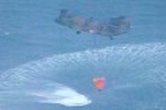 Japan helicopters dump water on nuclear plant