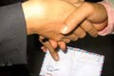 Bank official suspended for bribery