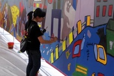 400 people paint record environmental mural