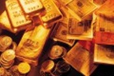 Gold stalls; dollar up