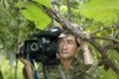 Photographer hunts in the forests