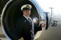 Travolta lands in Haiti piloting relief supplies