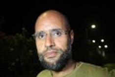 Kadhafi son in surrender talks as NATO ends Libya mission