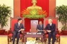 Party chief receives Lao and Chinese envoys