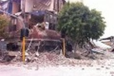 NZ leader says at least 65 killed in earthquake