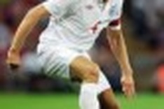 Gerrard rescues Capello as England get mixed reception