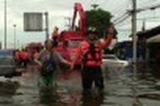 Bangkok's neighbours shoulder flood burden