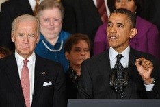 Obama takes first swipe in year-end spending showdown