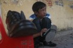 Shoeshine boy back on the street