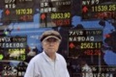 Asian shares extend gains on manufacturing data