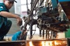 Industrial output creeps up