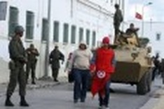 Tunisia's embattled government mulls major revamp