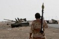 Blow for Kadhafi as key figure defects