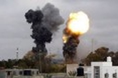 Air strikes rock Tripoli as world mulls arming rebels